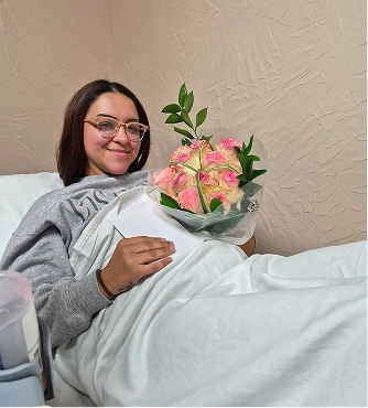 A young woman smiling